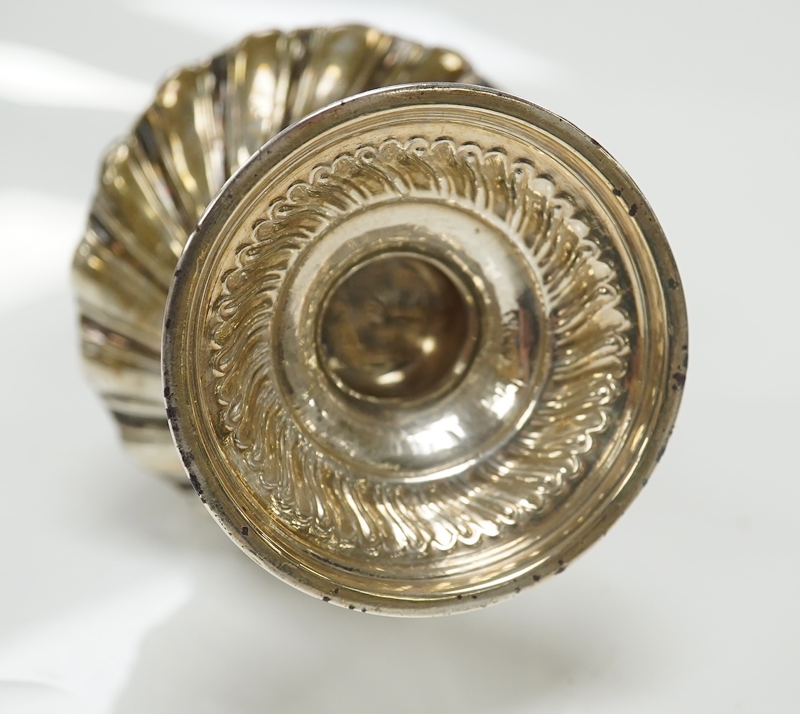 A Victorian repousse spiral fluted pedestal sugar caster, Thomas Bradbury & Sons, London, 1889, 18.3cm, 3.9oz. Condition - fair